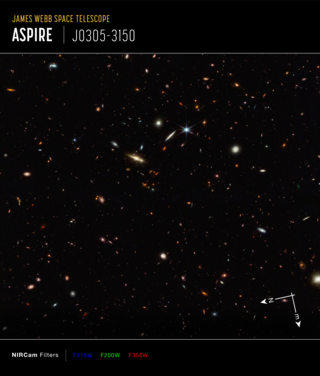 A deep field image with many colorful galaxies and stars in black space. Text at the top says "James Webb Space Telescope: ASPIRE J0305-3150". Text at the bottom says "NIRCAM Filters F115W, F200W, F356W".