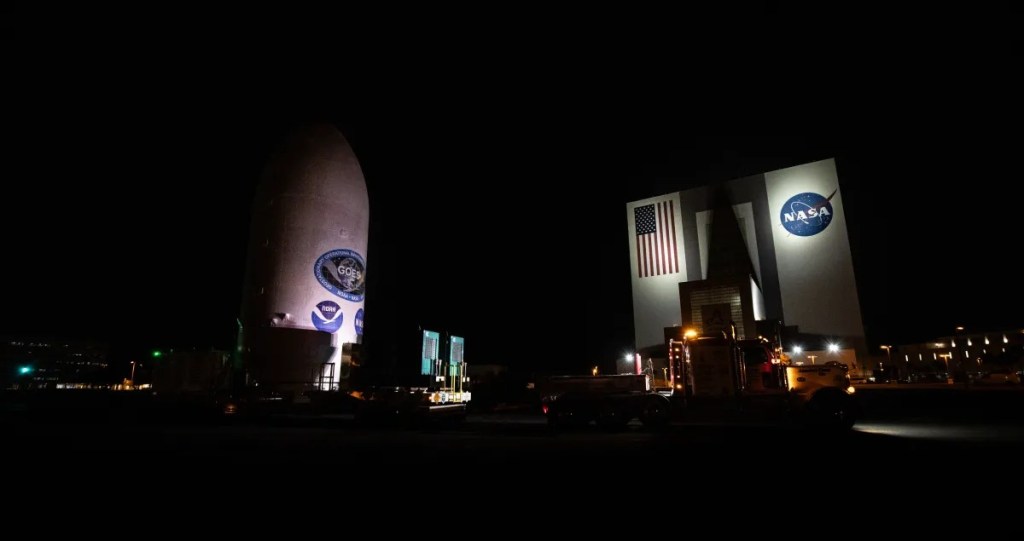 Rocket nose cone carrying GOES-U inside shown at nite.