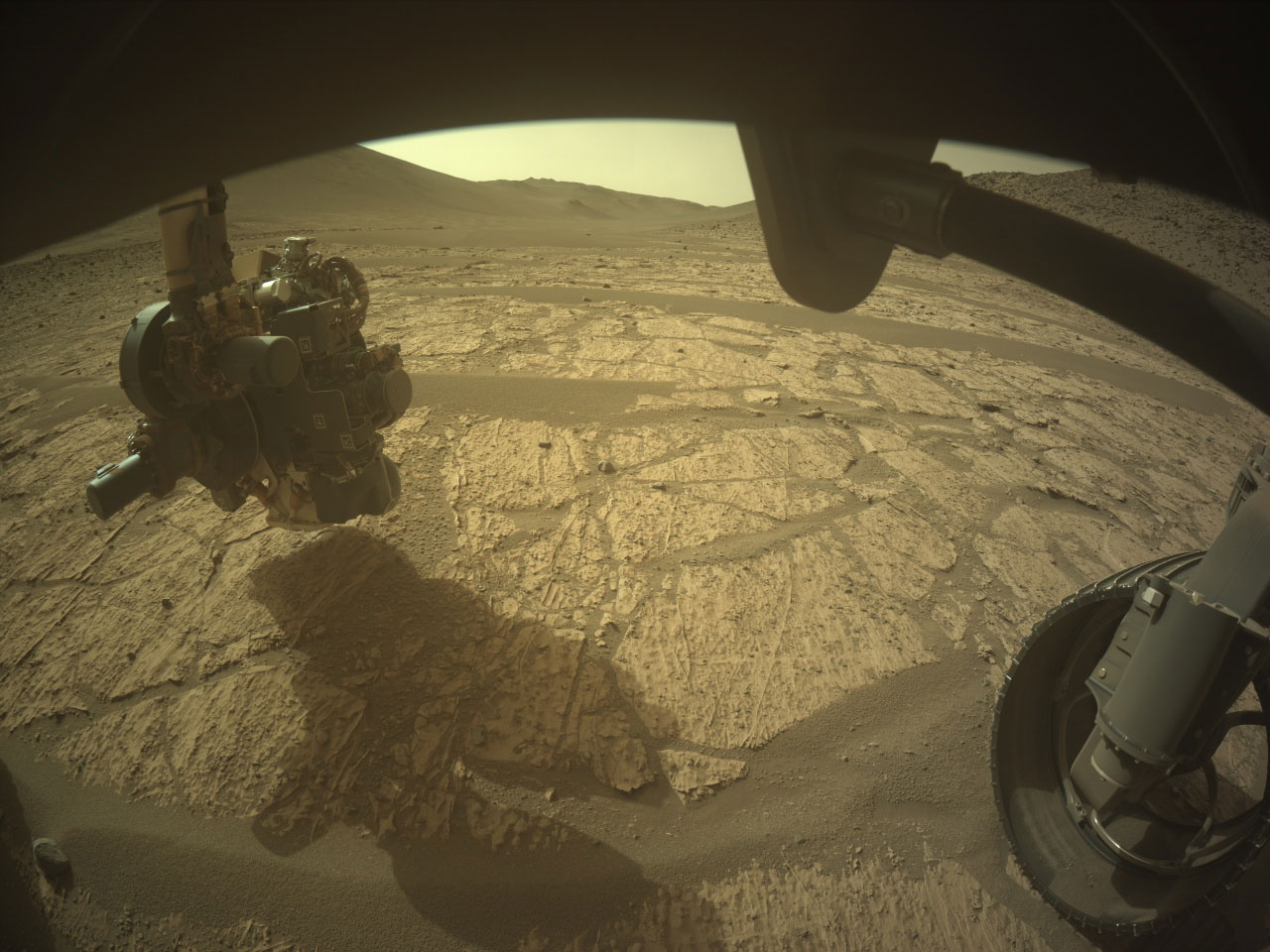 This image was acquired by the Front Right Hazard Avoidance Camera A on June 16, 2024 (Sol 1181) at the local mean solar time of 14:20:10. The image shows the area in front of the rover at Bright Angel with the arm extended as the PIXL instrument investigates the surface.