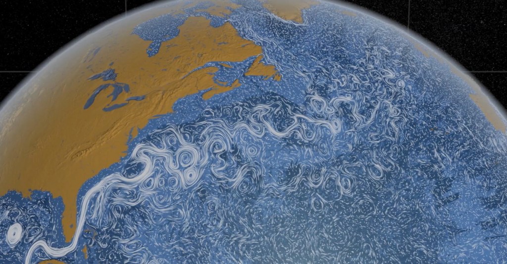 The image depicts a visualization of ocean currents on Earth, particularly focusing on the Atlantic Ocean. The intricate, swirling patterns represent the movement of water, showcasing the dynamic flow of currents. The landmasses, including parts of North America, Greenland, and Europe, are shown in a brownish hue, contrasting with the blue of the ocean. The currents are illustrated with white, wavy lines, emphasizing their direction and motion, creating a mesmerizing, almost artistic depiction of the perpetual movement of the ocean.
