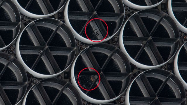 A close-up photo of damage to NICER’s thermal shields.