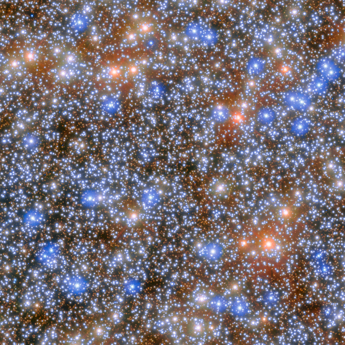 The central region of the globular star cluster Omega Centauri. It appears as a collection of myriad stars colored red, white, and blue on the black background of space.