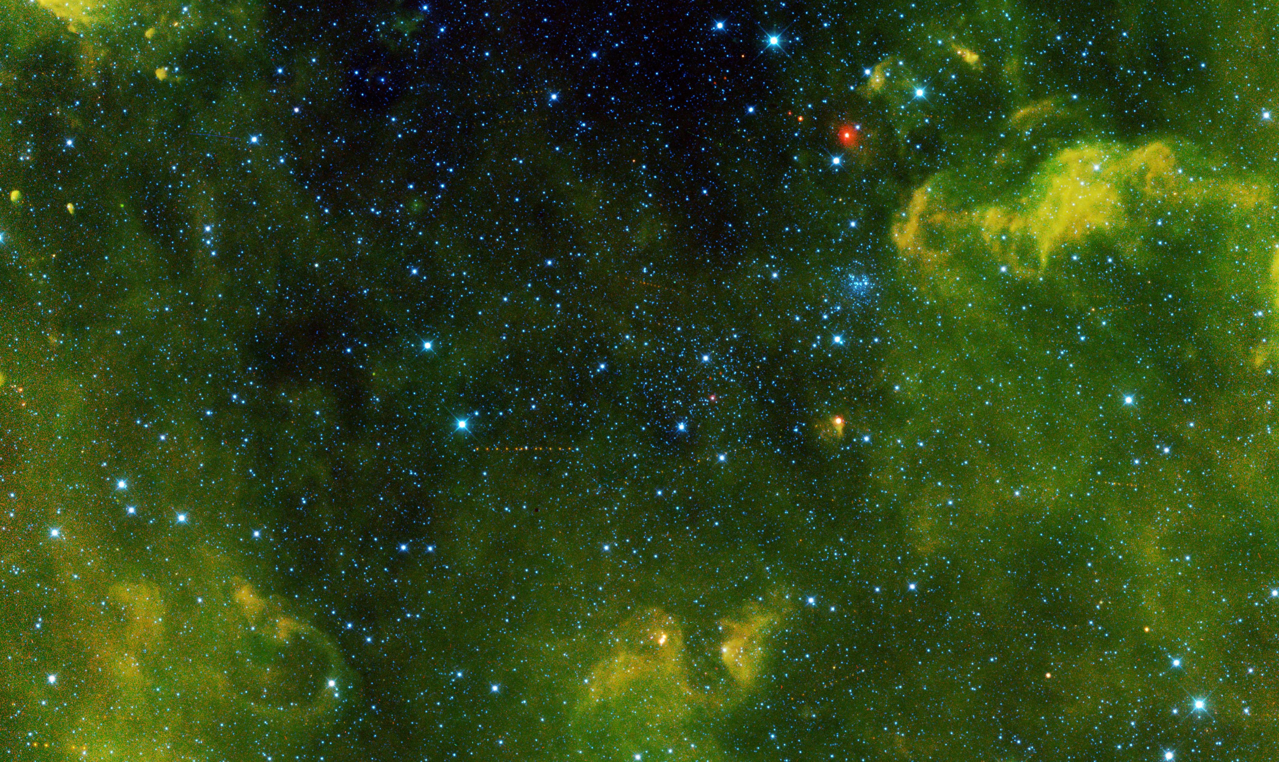 A star-studded space background shows a multitude of stars as various-sized dots in cyan, overlaid with a wash of bright olive and golden yellow swirls, palest in the center and heaviest at the left, bottom, and right edges of the frame. At center a line of a dozen tiny golden dots marches horizontally across the image.