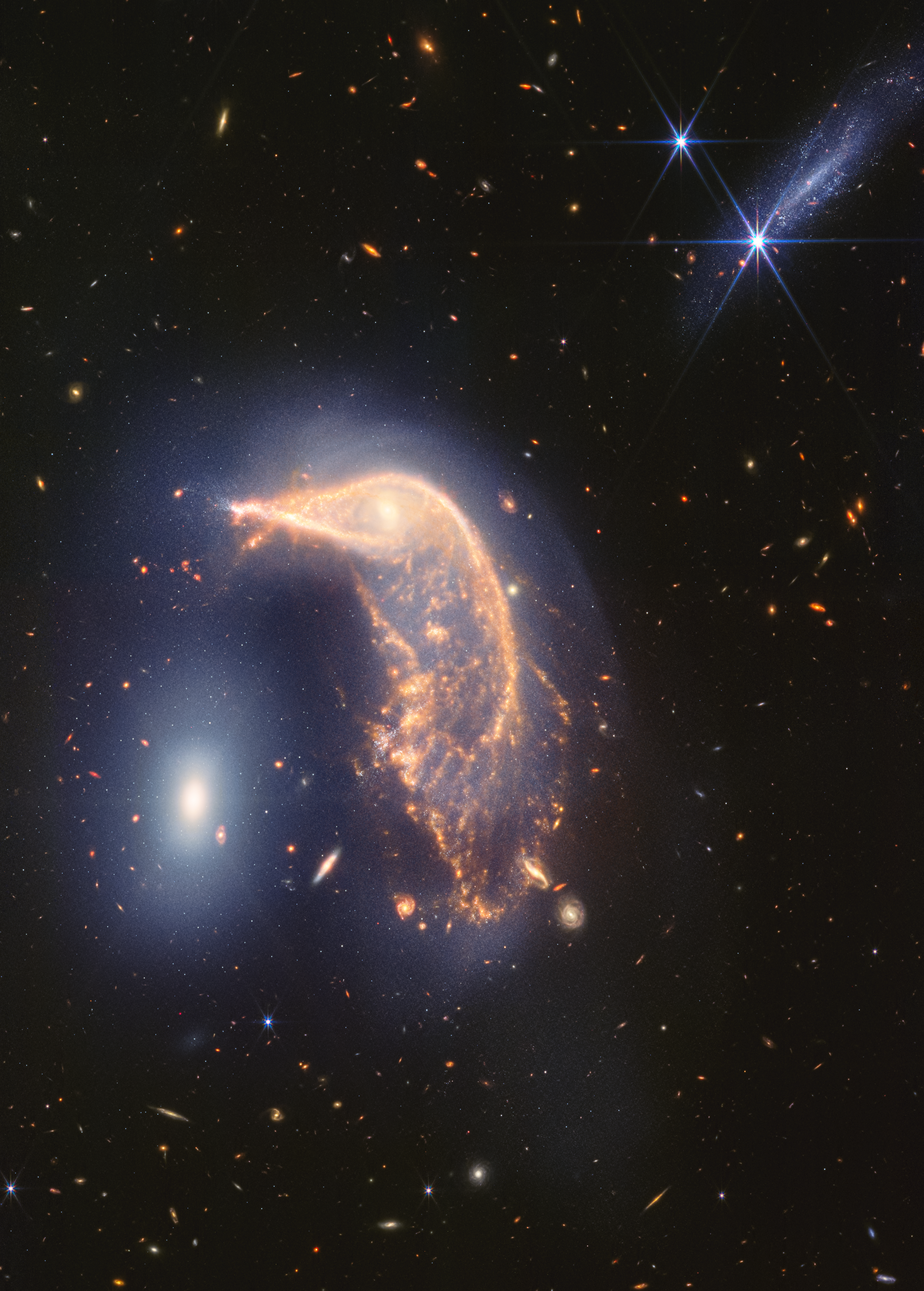 Vivid Portrait of Interacting Galaxies Marks Webb’s Second Anniversary