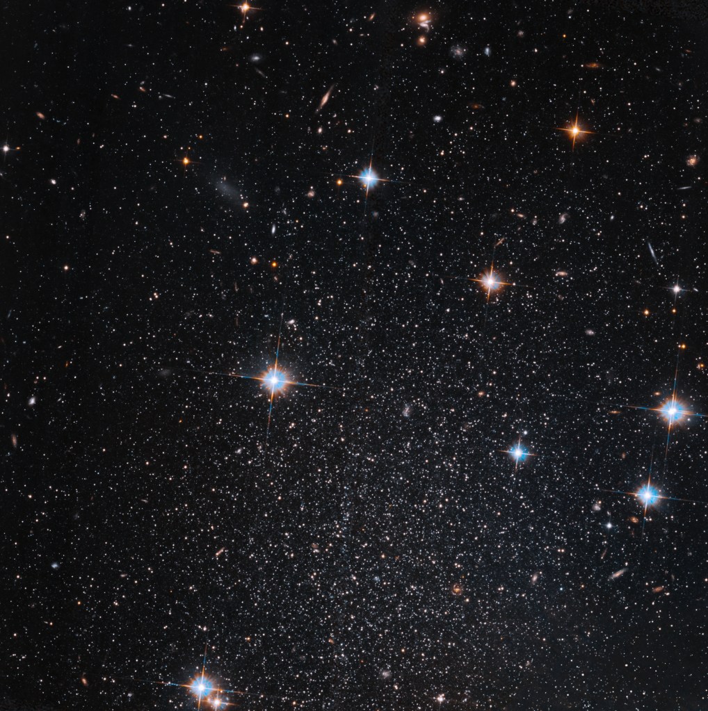 
			Hubble Pinpoints a Dim, Starry Mini-galaxy - NASA Science			