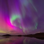 Ribbons of colorful aurora dance across the sky.