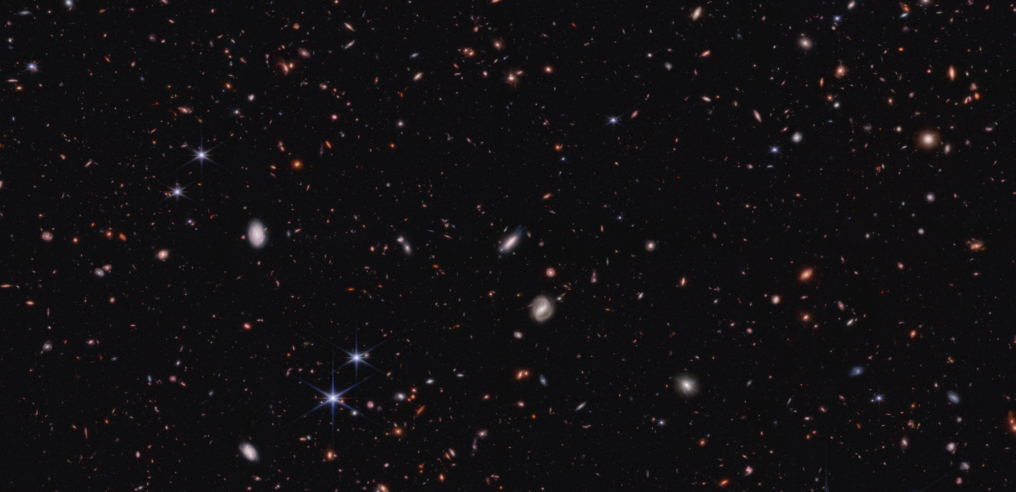 Webb Finds Early Galaxies Weren’t Too Big for Their Britches After All