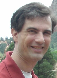 Portrait photo of a man outdoors