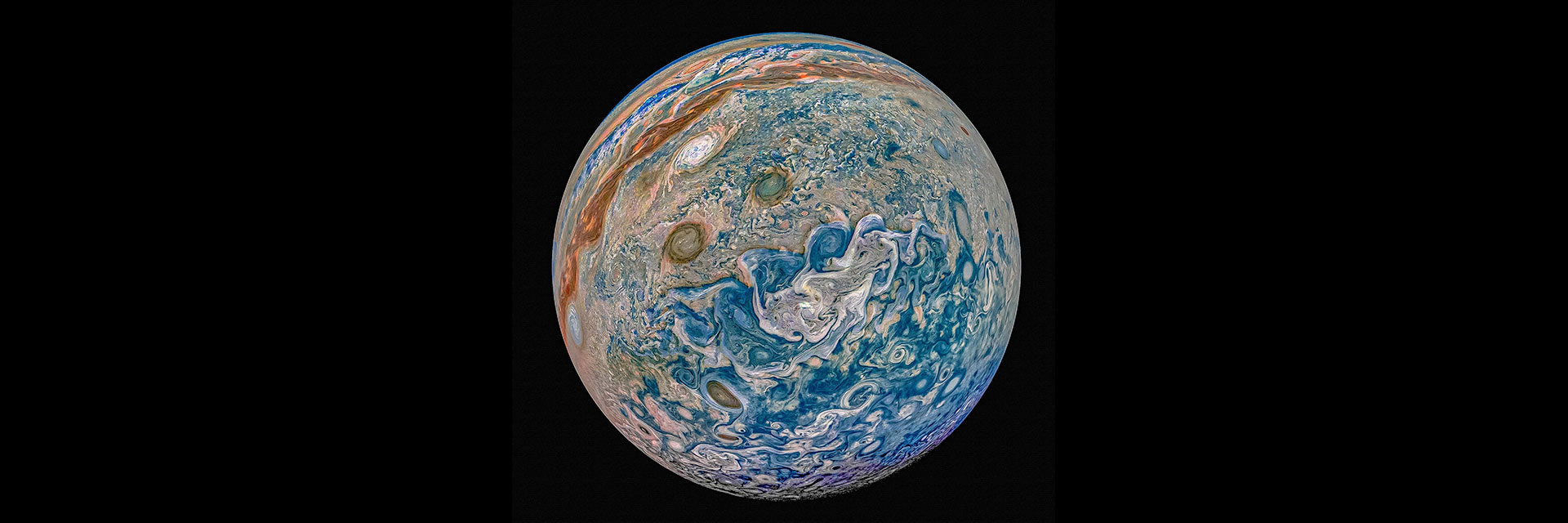 Citizen scientist Prateek Sarpal created this image showing Jupiter's stripes as deep blues, purple, orange, pink, and tan.