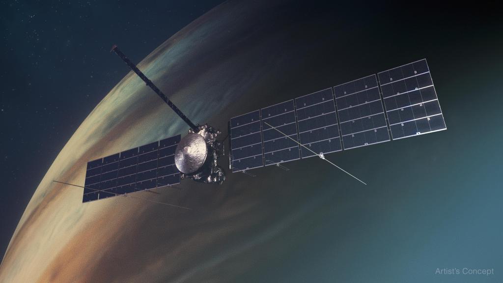 An artist's concept of NASA's Europa Clipper above Jupiter. The spacecraft's solar panels appear dark gray. Instruments can be seen protruding from the spacecraft. Jupiter has pale stripes of beige and reddish-brown.