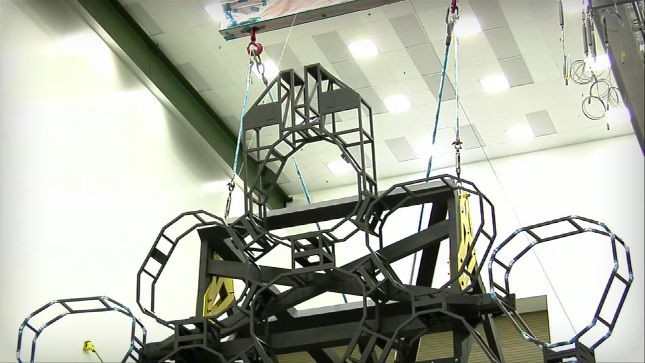 View of a portion of the James Webb Space Telescope backplane component that will hold the primary mirror segments. Eight sections that will hold mirror segments are in full or partial view.