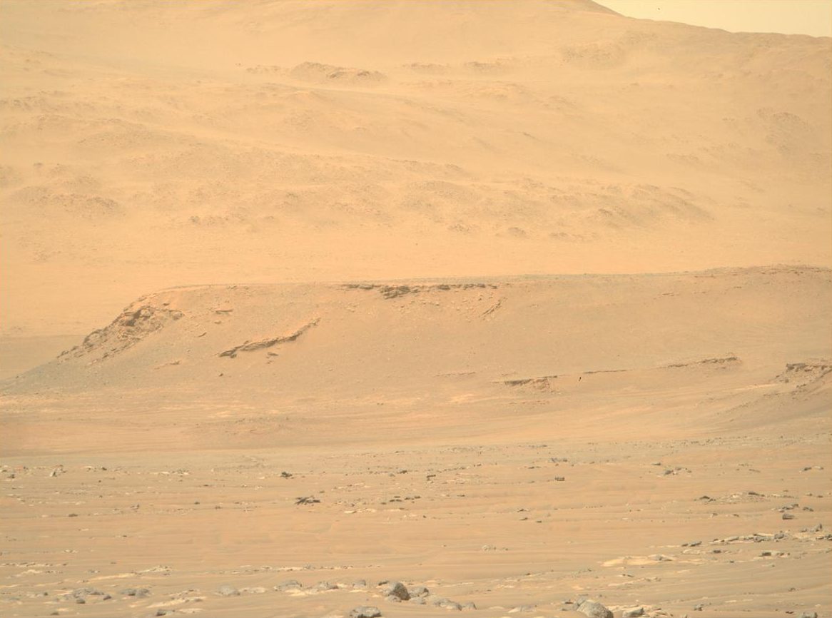 NASA's Perseverance rover took a photo of the Mars terrain of a bedrock in exposed rocks on the rim.