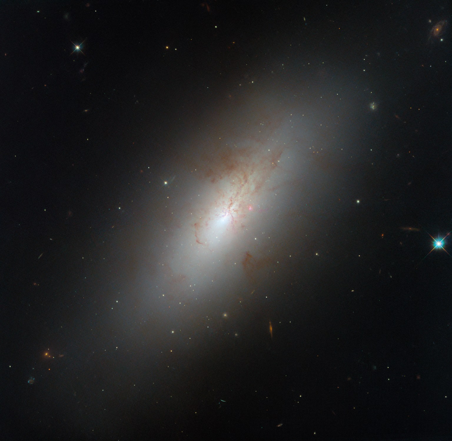 Hubble Observes a Peculiar Galaxy Shape - NASA Science