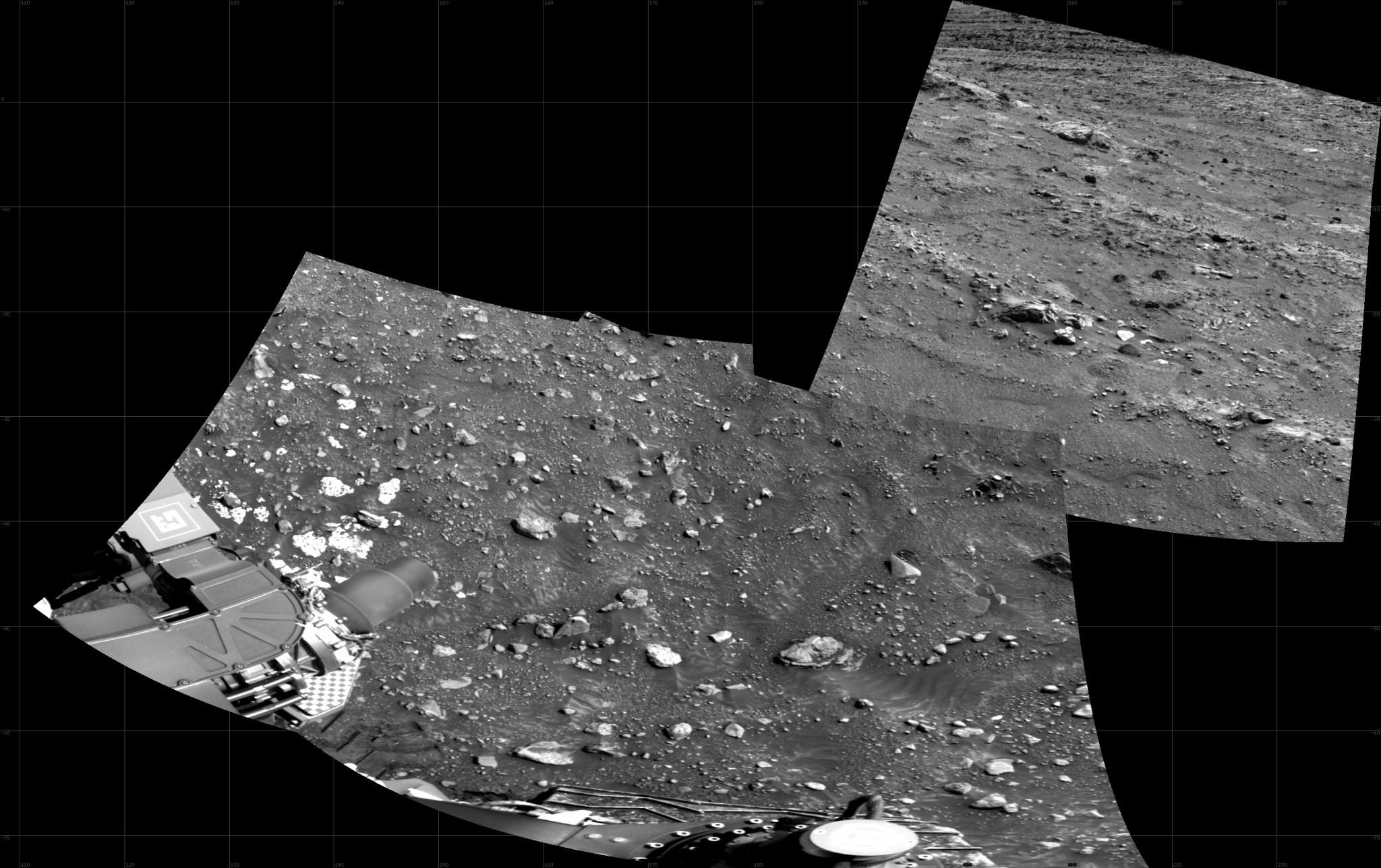 Gray-scaled images that were stitched together of Curiosity's workspace at Gale Crater, on Mars.