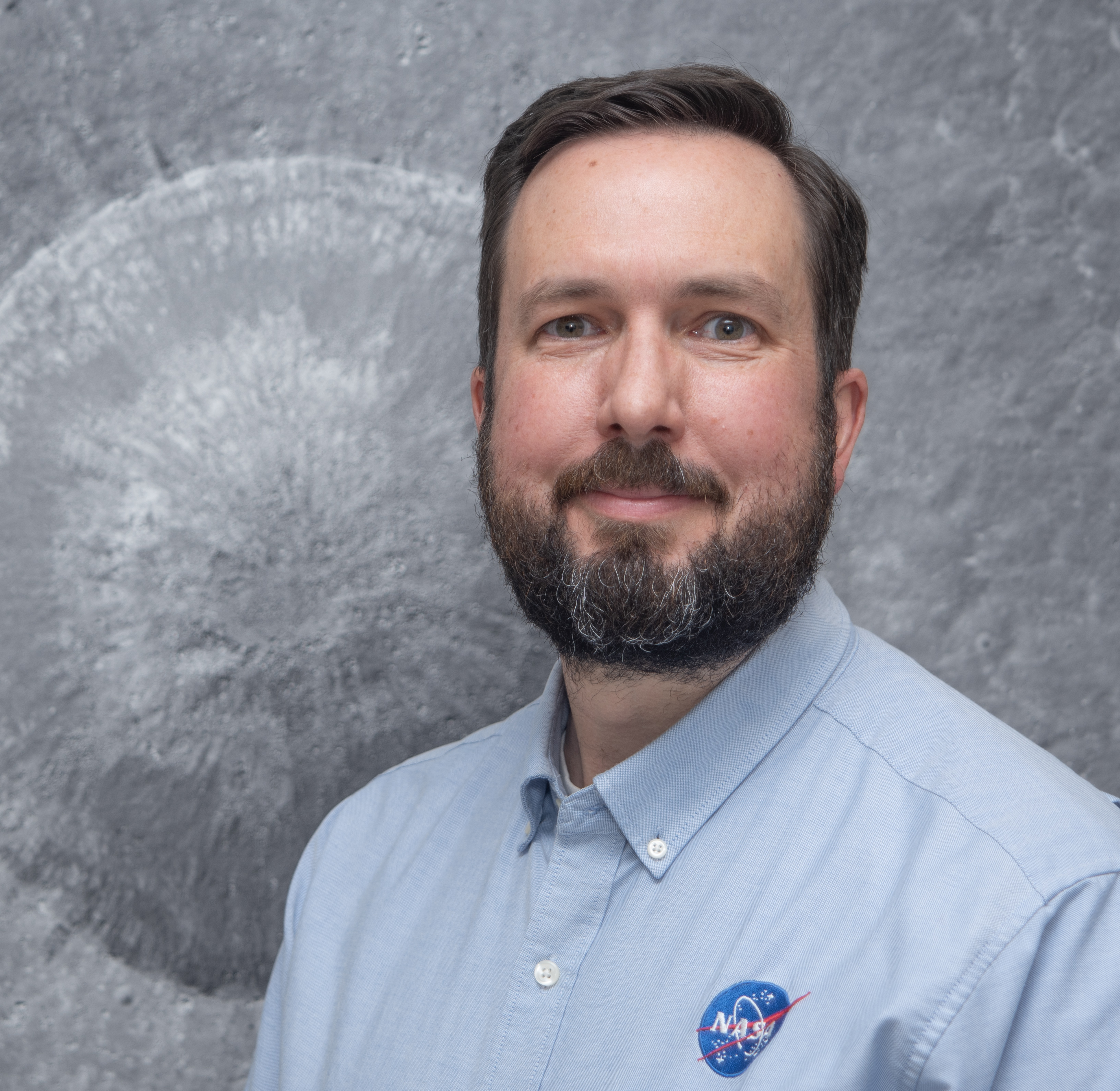 A portrait photo of NASA scientist Noah Petro.