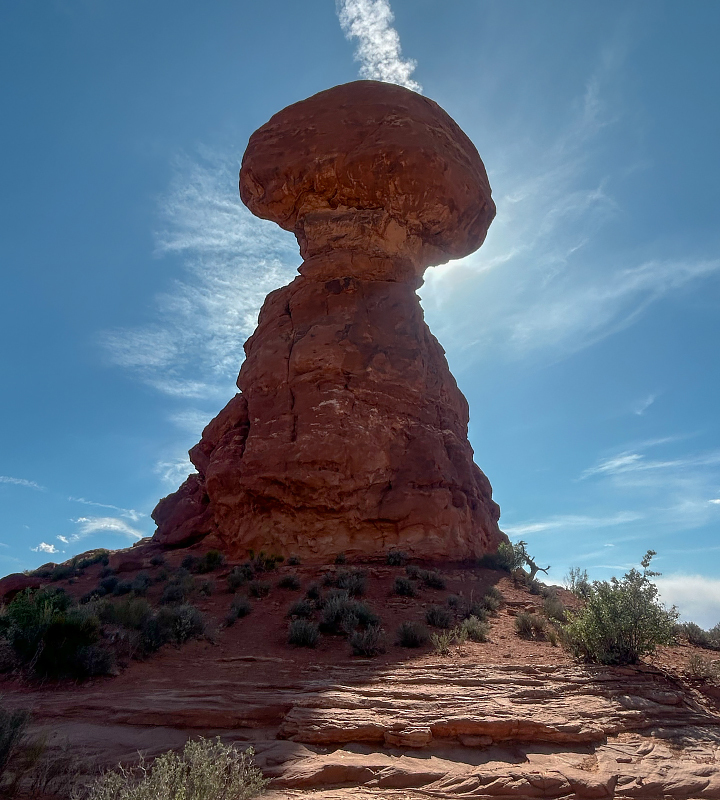 A photograph of Balanced Rock shows a large red circular boulder perched on top of a thinner pedestal of rock.