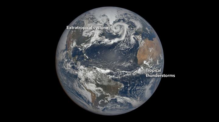 A satellite image of Earth shows thunderstorms near the equator and a sprawling comma-shaped extratropical cyclone over the North Atlantic Ocean on June 10, 2025.