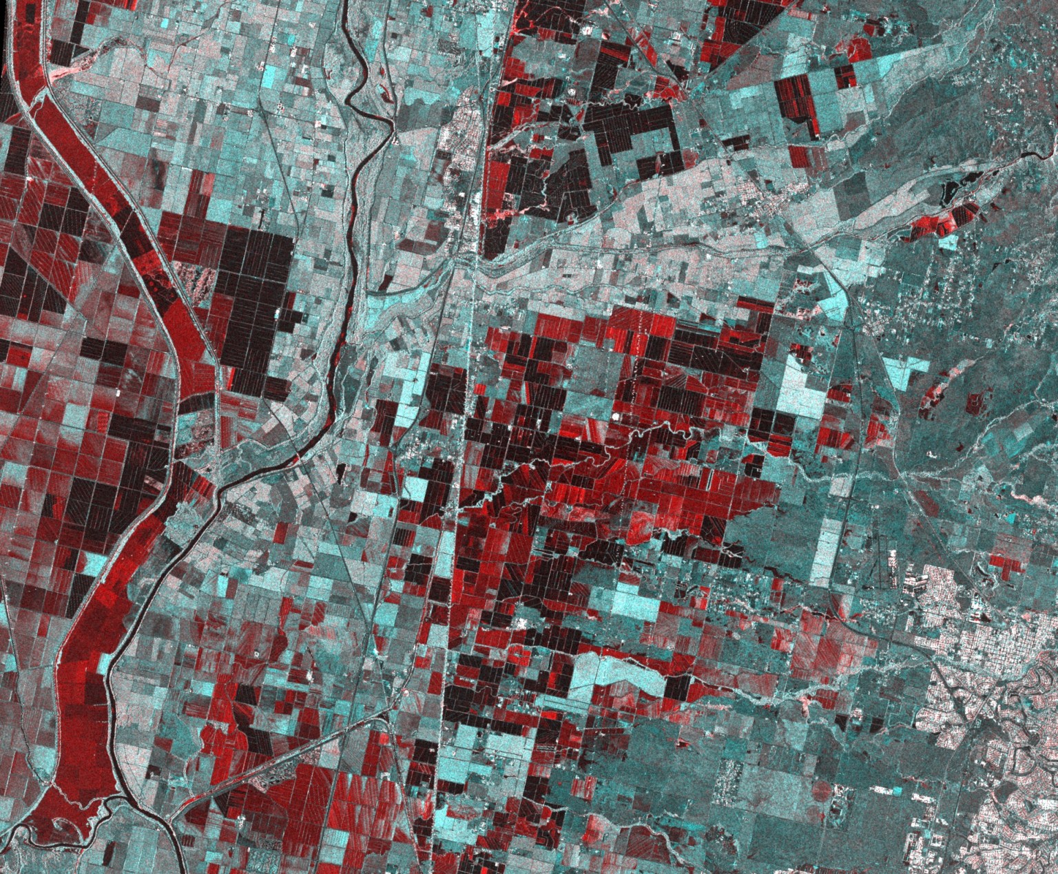 A RADARSAT-2 image of flooding in Sacramento, California. (Flooded areas are depicted in red.)