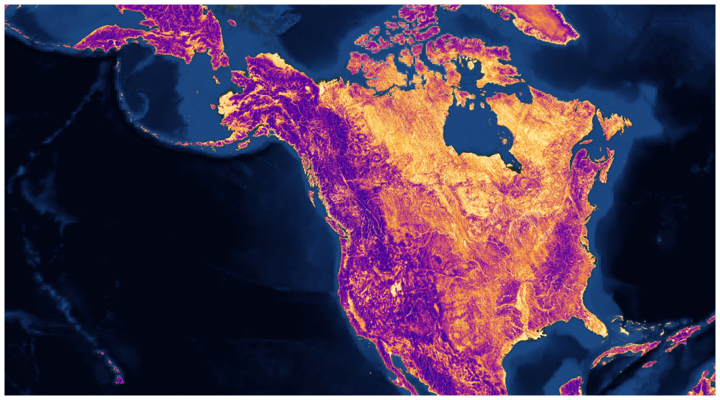 Satellite data map showing 3-km land surface reflectivity across North America. The landmass displays varying reflectivity levels rendered in vibrant shades of bright yellow, orange, pink, and deep purple set against a dark blue background.