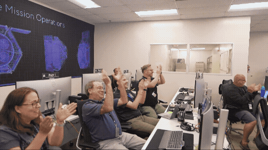 Gif of a room full of people clapping