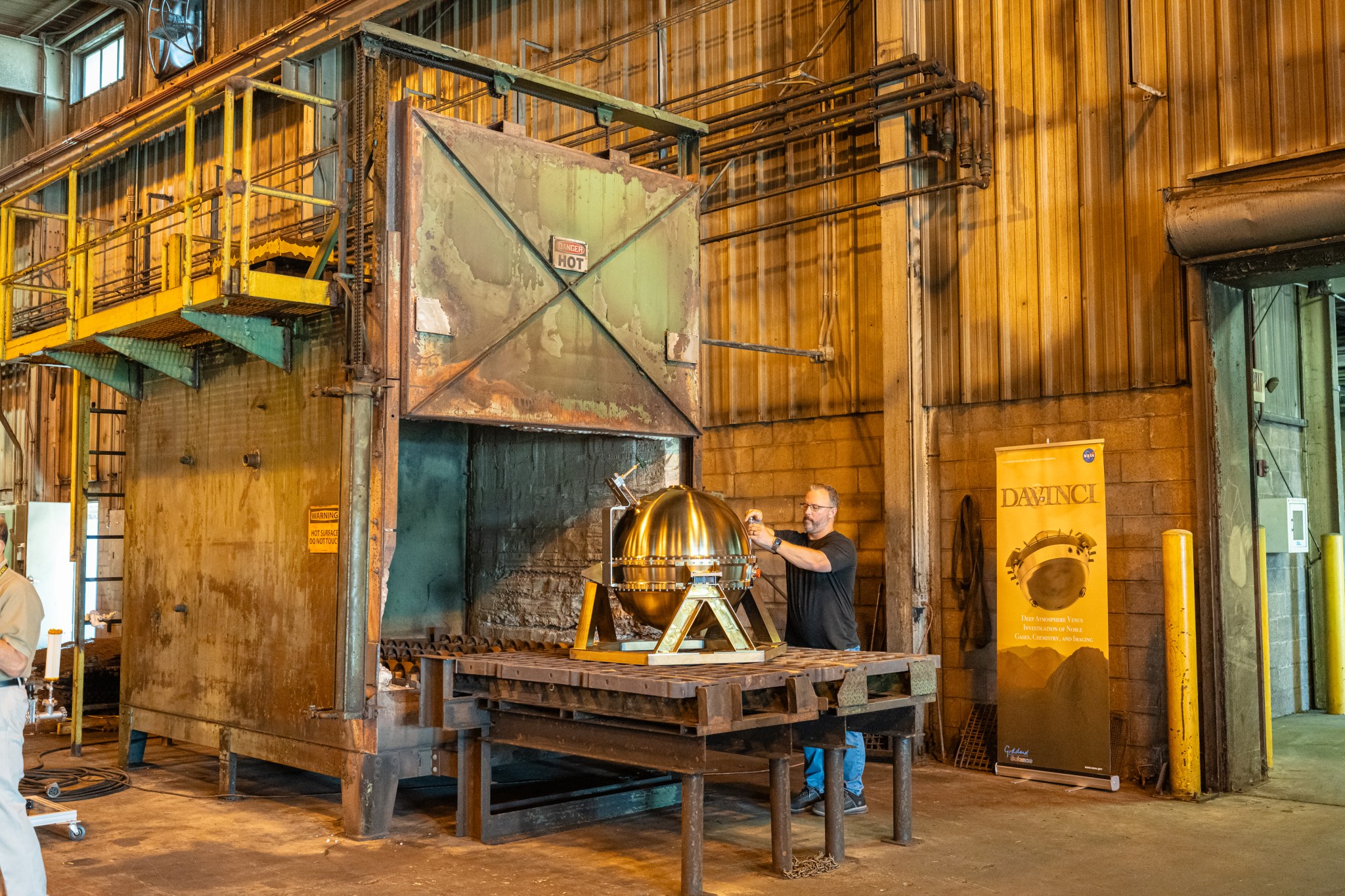 Photo of a technician prepping the DAVINCI descent probe for a heat test